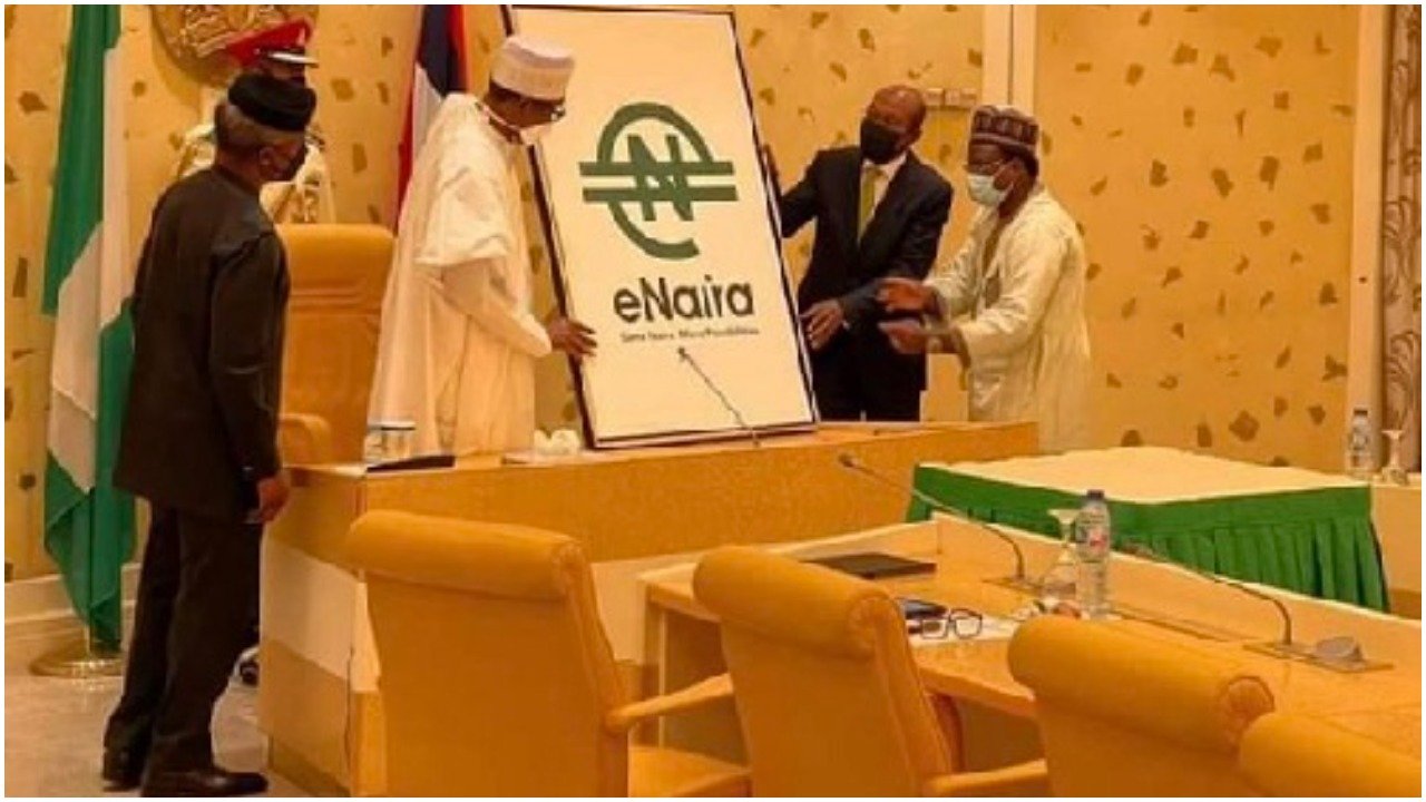 Picture of President Buhari unveiling eNaira